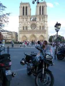 Traveling to Paris by motorbike - parked outside Notre Dame