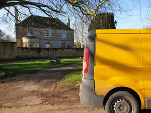 Yellow Vauxhall Vivaro van